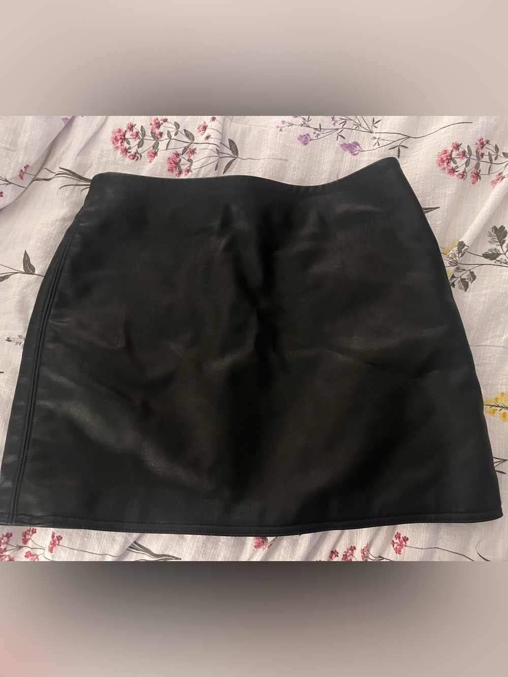 Black faux leather mini skirt